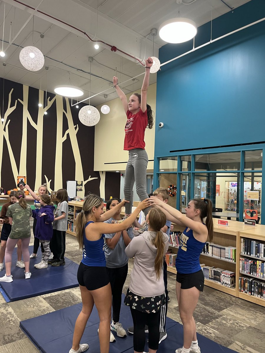 HistoryHilary's tweet photo. Our coed cheer squad was so excited to have #LFVCT come visit us and work on jumps &amp; stunts! 🎀📣@LFHS_Scouts @LBMS65 @LakeBluffSD65 https://t.co/1cC5g89qoP