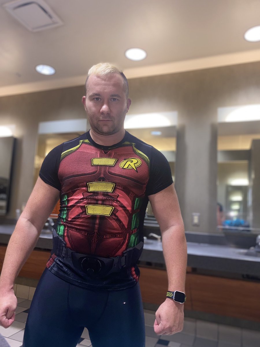 Tyler_Klein's tweet photo. It’s Halloween season so you have to go to the gym in a costume. #nerdworkout #robin #GothamKnights #wrestling https://t.co/o9a7YaiDGI