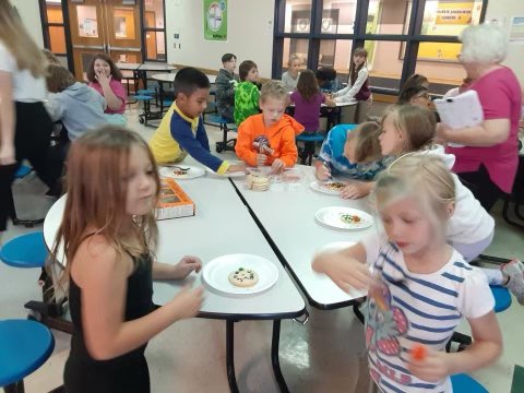 MrsJordan19's tweet photo. @StarrCoyotes.  Coyotes treasure responsibility!  Today we honored the children who sold a box of chocolates for our fundraiser and turned in their money on time.  All of these kiddos got to  participate in a cookie decorating party.  A loud and proud coyote howl to all of you! https://t.co/uiap17kdZm