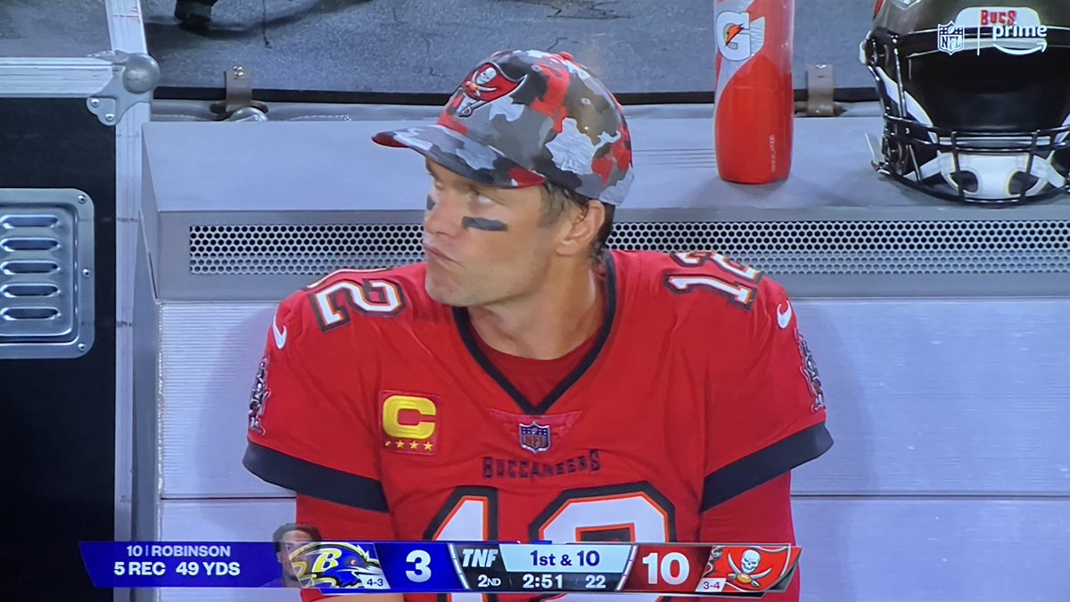 Tom is sitting with all his friends.