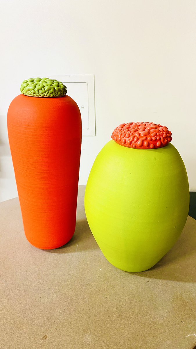 I made these vases with gloopy lids.