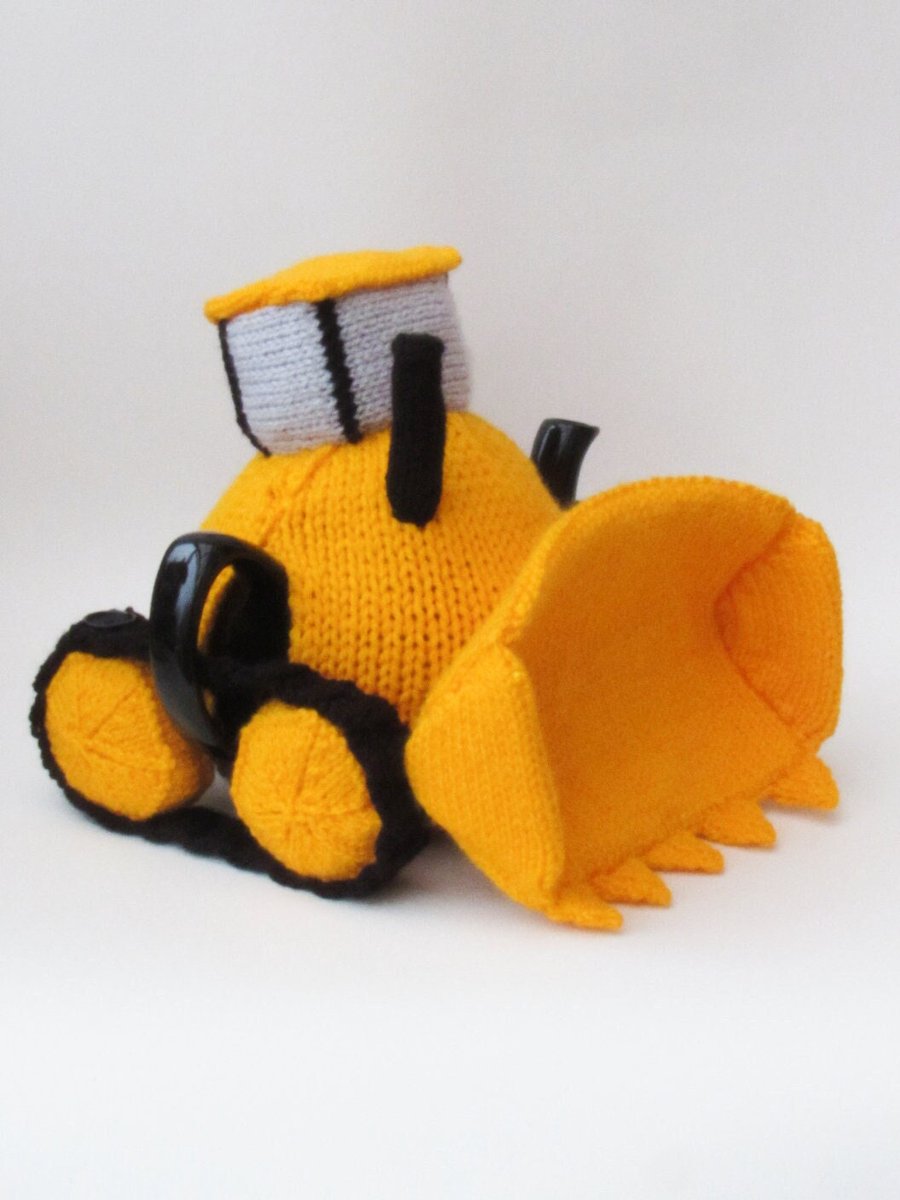 TeaCosyFolk's tweet photo. It's like a Tonka Teapot! Bulldozer Tea Cosy Knitting Pattern to knit your own teapot cover of a cat excavator - perfect for Builders tea. https://t.co/sYFP7HF5oq #fathersday #knitting #bulldozerteacosy #knittingpattern #bulldozerpattern #TeaCosyFolk https://t.co/q4tqNNbZGS