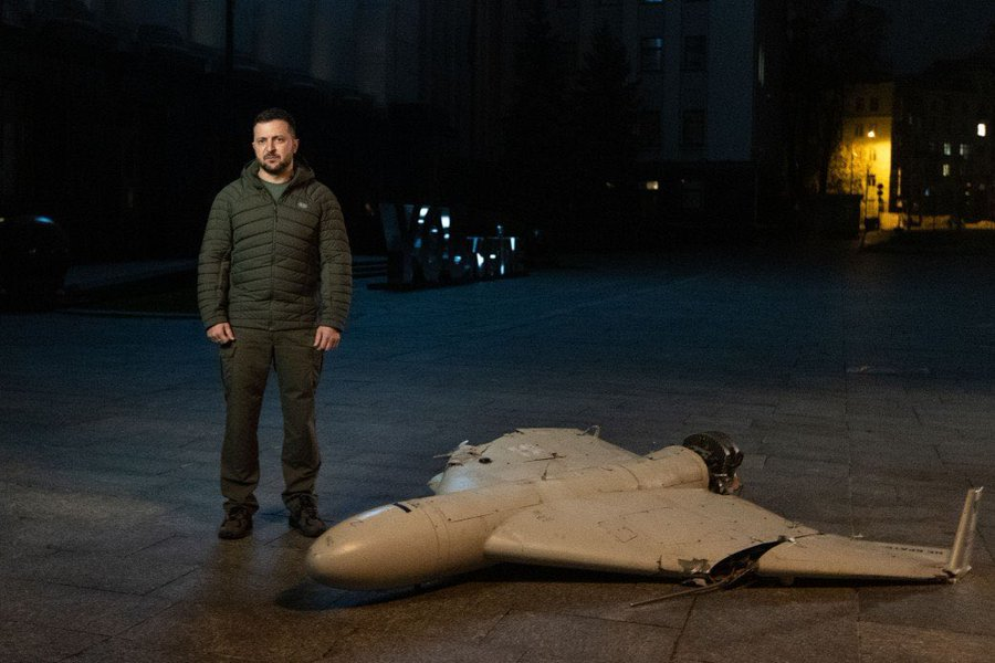 Euan_MacDonald's tweet photo. Ukrainian President Volodymyr Zelenskyy stands next to the wreckage of an Iranian Shahed-136 drone, which Iran denies having supplied to Russia, and which Russia uses to attack Ukrainian cities. https://t.co/yLacMUUZZk