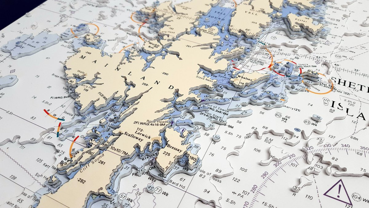 Two hand cut models from the opposite end's of the UK | Shetland and the Isle of Wight | 80x60cm | made to commission by landfall.co.uk | #shetland #isleofwight #sailing #mapgifts #nauticalcharts #interiordesign #Christmas #birthdays