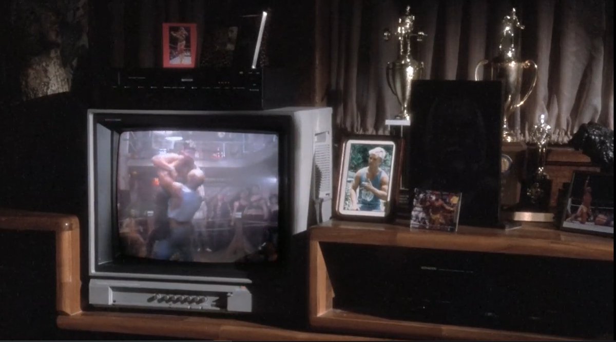 Rip's little photo shelf is just pictures of Hogan in the WWF in the red and yellow. That's just lazy. #NoHoldsBarred