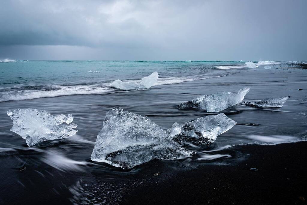 a_saliga's tweet photo. Diamond Beach (Breiðamerkursandur) - Southern Iceland // Ice fragments from the nearby Breiðamerkurjökull Glacier drift to this black sand beach.
.
.
.
.
#discovericeland #earthoutdoors #eclectic #exploreiceland #guidetoiceland #hiking #iceland … https://t.co/ijU4XuIwqW https://t.co/RnC8mGnaur