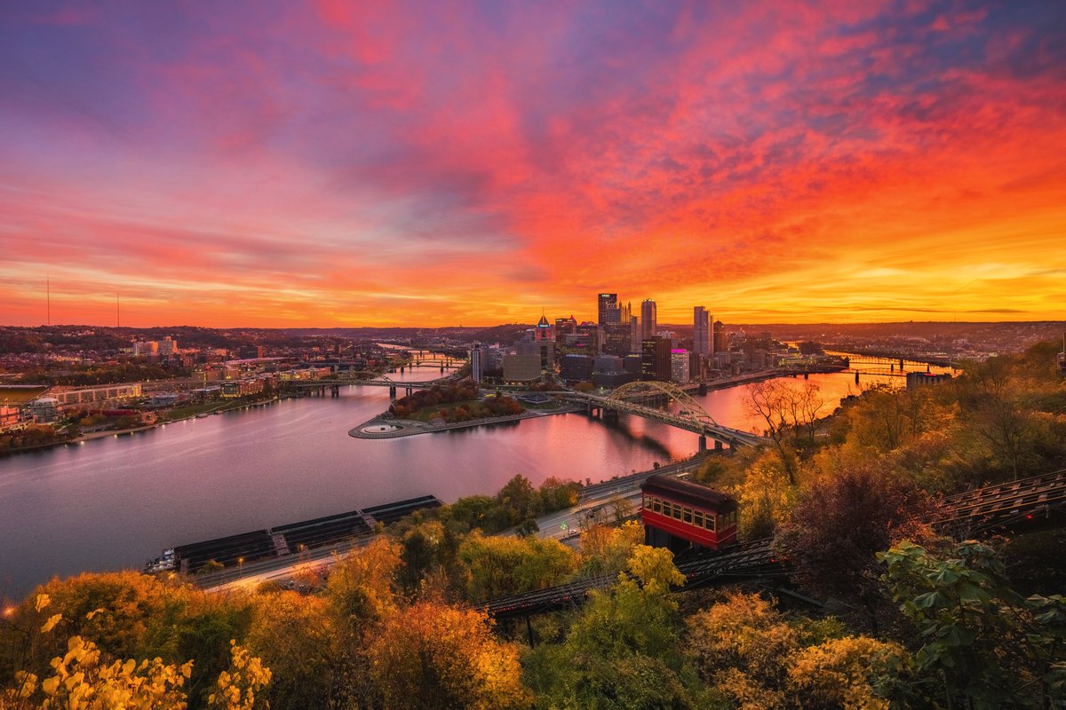 DaveDiCello's tweet photo. Holy pierogi. What a sunrise to kick off the weekend in #Pittsburgh.

Not only was the color insane, but it lasted forever. These images nearly half an hour apart, and you can see that the color is incredible in both. Might be the best fall sunrise I've ever shot from the incline https://t.co/GKyPqYlqyG