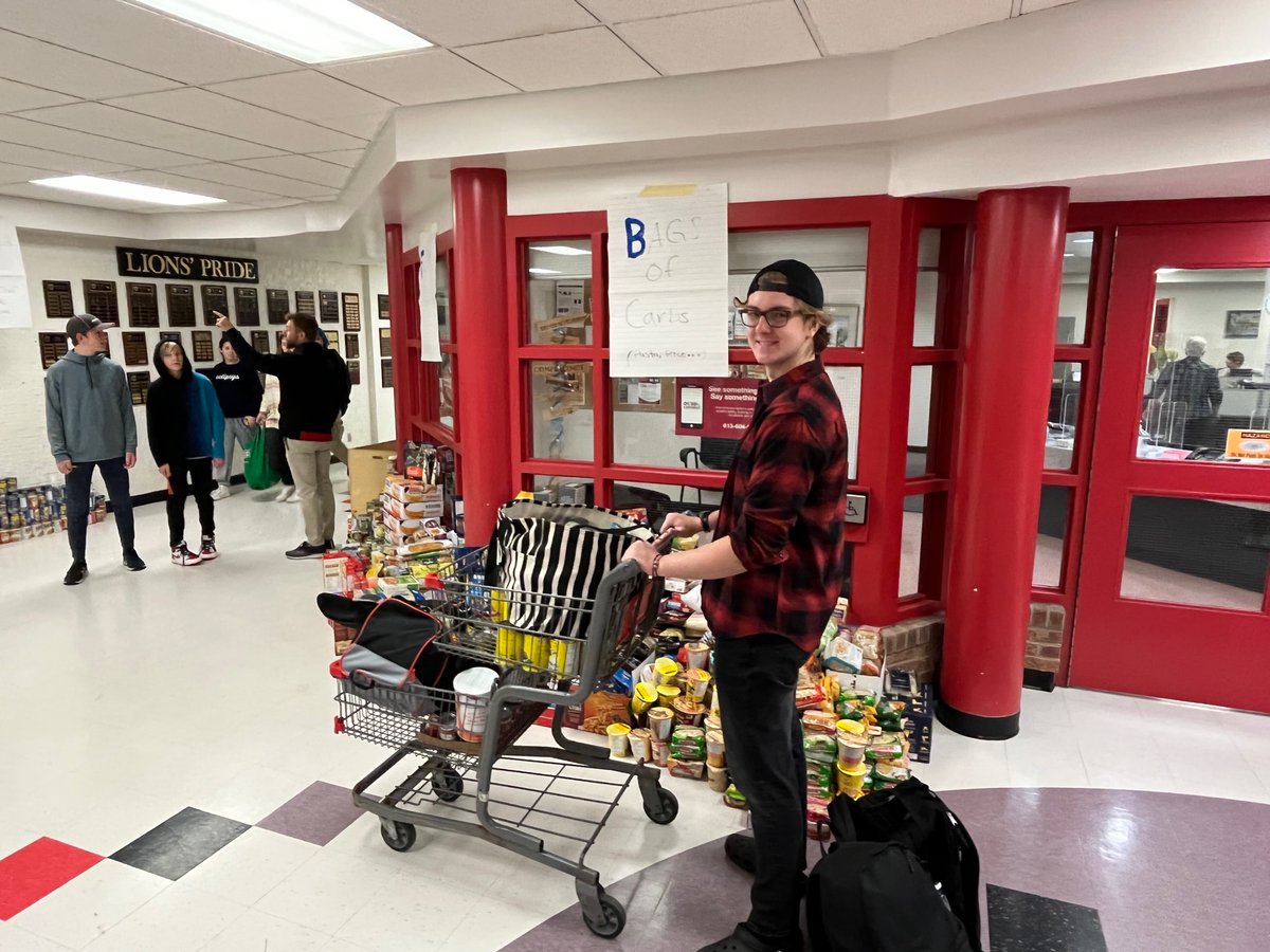 StMarkOCSB's tweet photo. St. Mark Canned Food Drive is in full swing. Over 10000 cans and $8000 raised so far. Lots of need in the community - keep it up Lions! #MyStMark #LionsPride https://t.co/5bA3yzFn0D