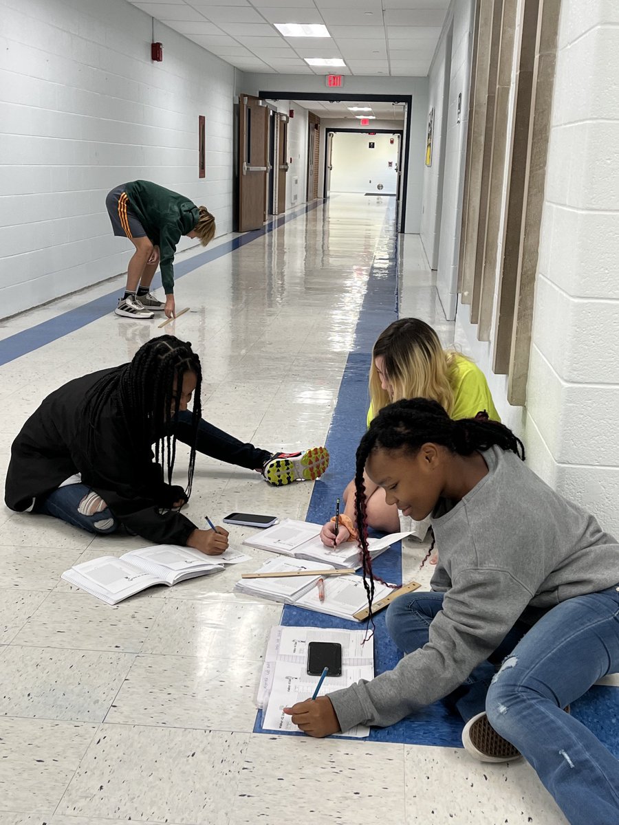 SJUptonBears's tweet photo. Wyatt, Noa, Jada and Terryanba taking measurements of “Zombie Walk” a.k.a. Time &amp; Distance Lab in Mrs. Hubble’s class. https://t.co/yUfMjFP61C