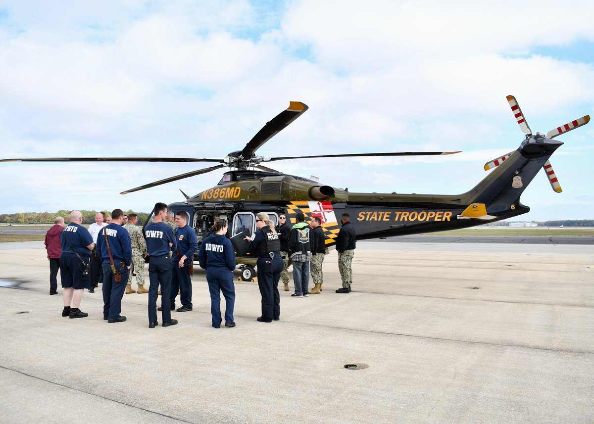 NASPaxRiverPAO's tweet photo. Trooper 7 on deck! Pilots and crew with Maryland State Police ( @MDSP ) Trooper 7 helicopter came to Pax River Oct. 26 to discuss interoperability and capabilities with NAS Pax River’s leadership and operations department. 
#paxpros #MDStatePolice https://t.co/fPBqZ1El4R