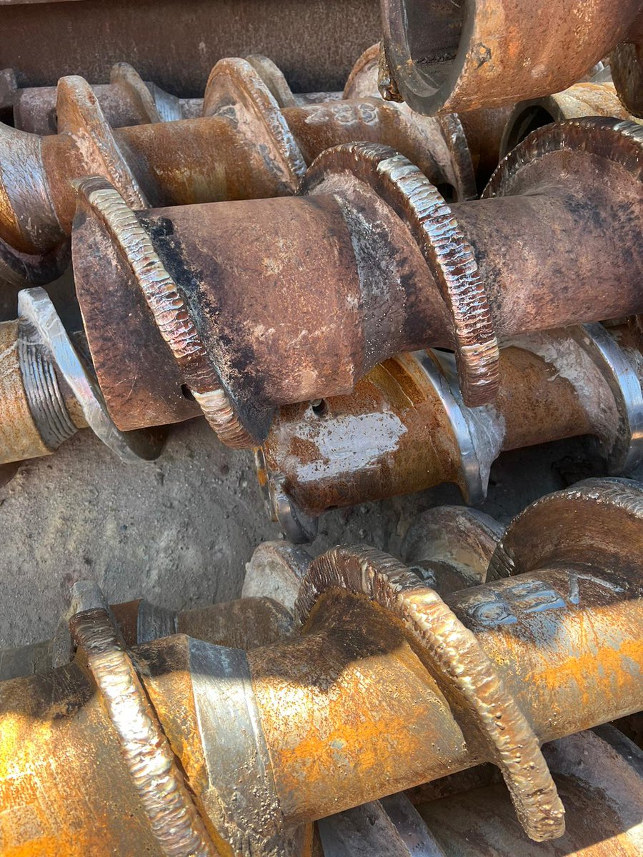 CorewireLtd's tweet photo. #FridayPhoto - Our CC190MC being used in anger on these augers. An economical, cost effective reclamation solution that is fit for purpose and suits the application perfectly for this customer. #Hardfacing #Corewire #ReclaimReuse https://t.co/Lp9xdm81F0