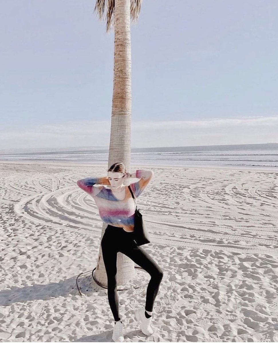 Let the ocean set you free - <a href="/urszulala/">Ula</a> is beachside in our Arc En Ciel Sweater + tap to shop her LOOK and now available to shop on <a href="/neimanmarcus/">Neiman Marcus</a> ! #plasticfree