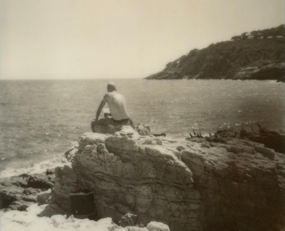 Sa Riera Rocks #2 - 4 x 5 in Oil on Panel Plein air from July 2022 with a polaroid of a lumpy beached sea bear by my wife.  On view at the <a href="/principlegall/">Principle Gallery</a> for the Nov. 18th Solo Exhibition.