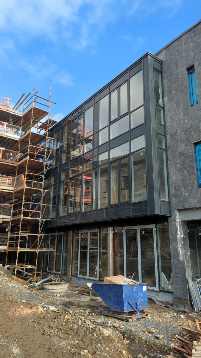 IAT04's tweet photo. Virginia Library installation begins to appear from behind the scaffolding. Hard work beginning to shine through. https://t.co/8fQ9TOZNQB