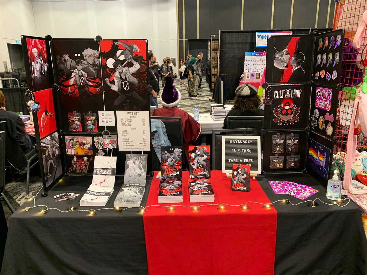 byelacey's tweet image. all set up at J14 in the ballroom at #halcon2022!! come say hi! 🦇🤍