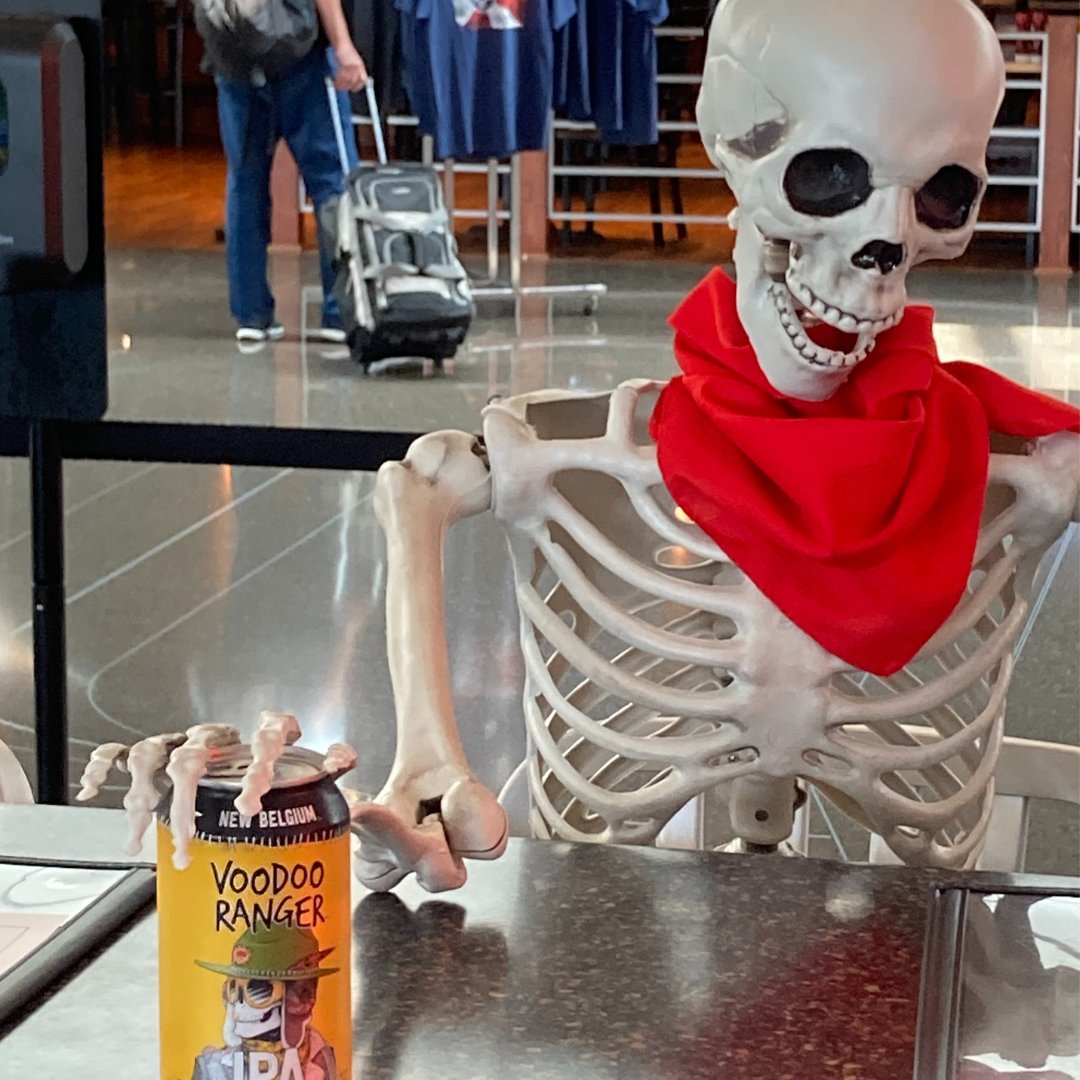 FlyICT's tweet photo. Red is glad the Air Capital Bar carries his favorite beer. #RedSkeleton, #airporttwitter https://t.co/pCf3j24qQO