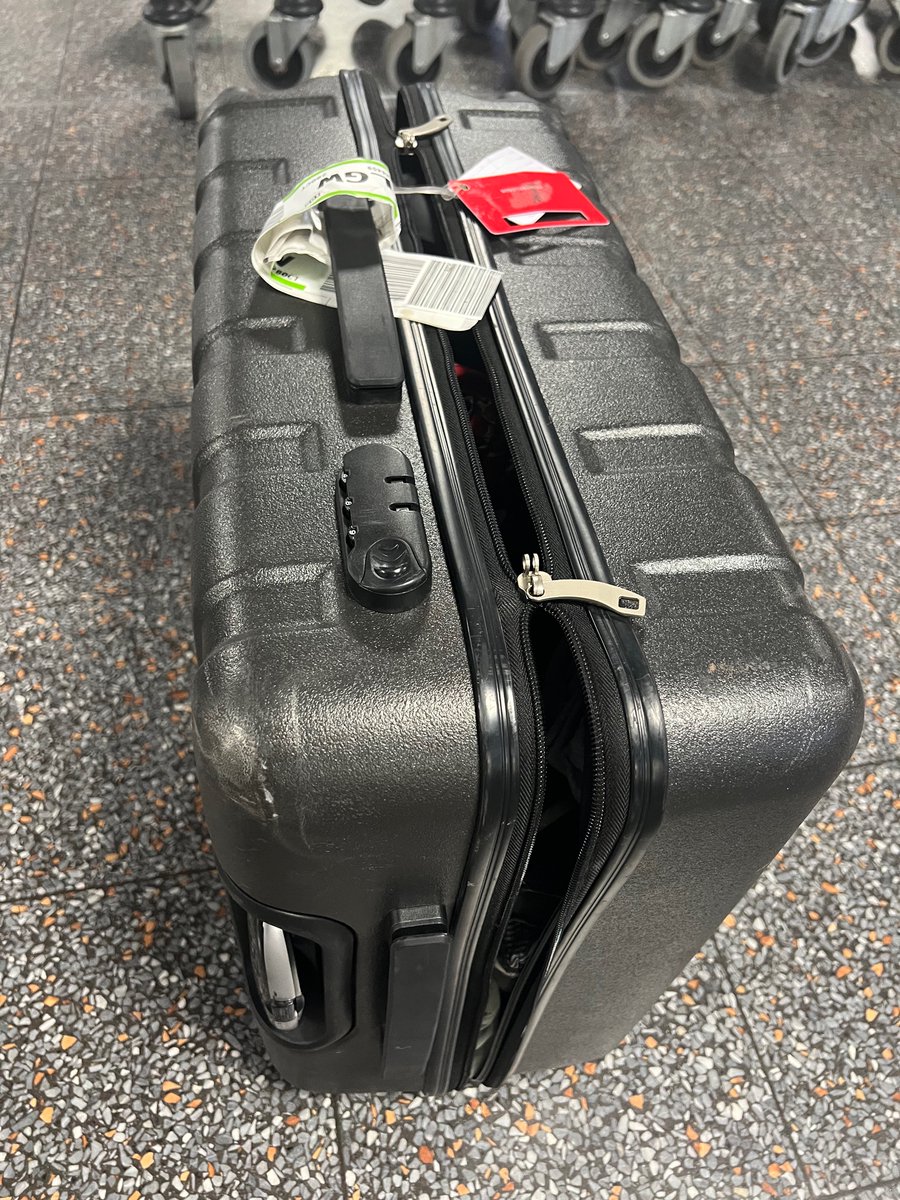 Bexst8r's tweet photo. @TUIUK if being delayed by 24 hours wasn’t enough. This is how our bag was returned. Belongings inside damaged, including cycling helmet. There was a lock on it when we handed it over, returned blatantly rummaged through. How do i claim? https://t.co/bWzTYlhBxP
