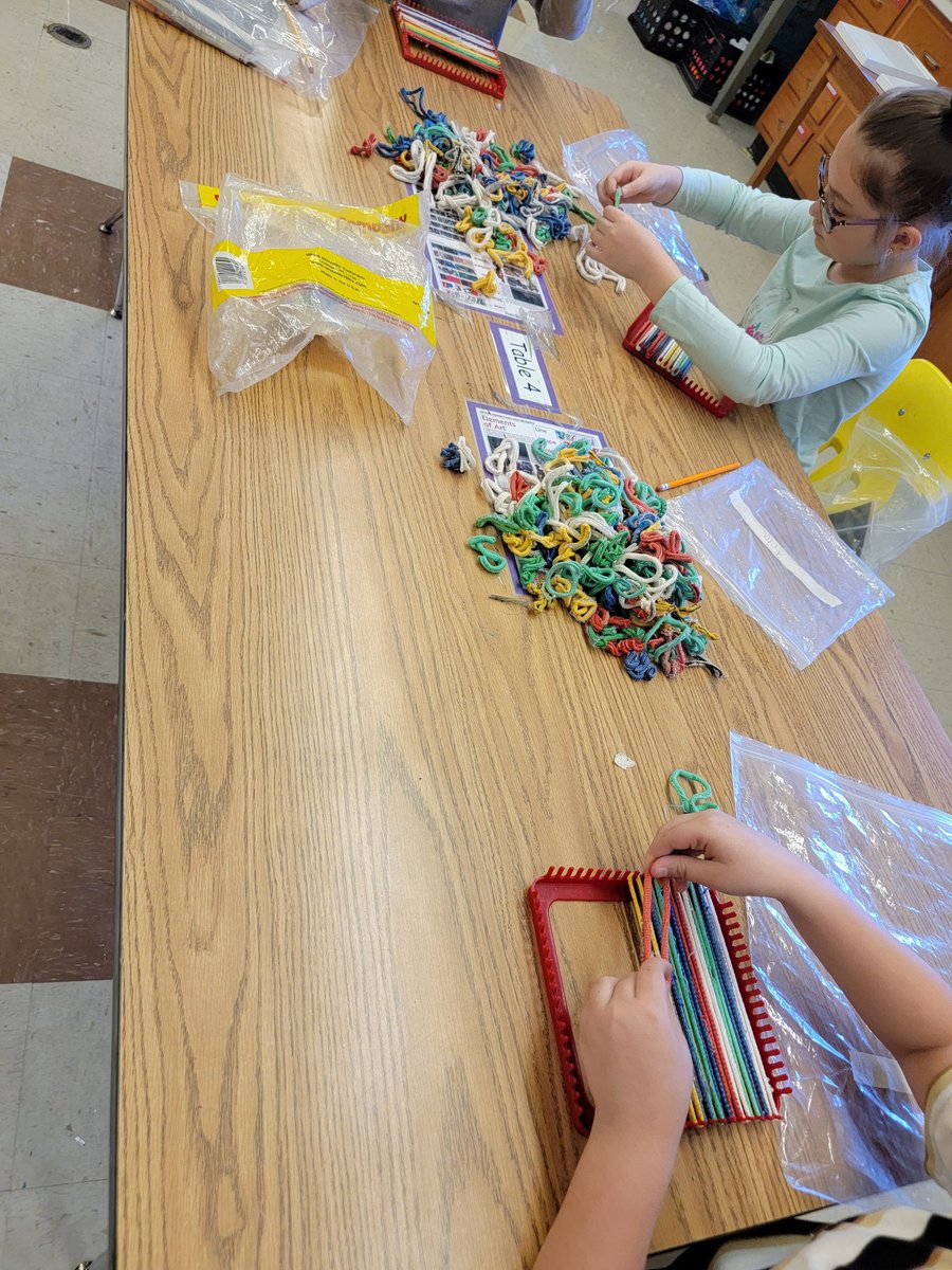 2nd grade students working on their projects. Some working on masks, some weaving, and some using sand to create a picture showing things that are important to them. They were inspired by the Native American art we discussed. #wlcardpride