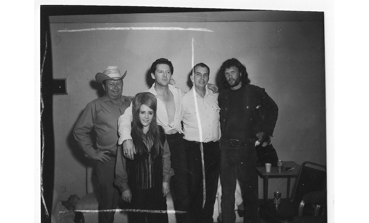 Jerry Lee Lewis, Kris Kristofferson and, at far left, Panther Hall co-owner Corky Kuykendall with two fans at the legendary Fort Worth venue. (From the <a href="/txst/">Texas State University</a> libraries, circa 1967-1972.)

dc.library.txstate.edu/node/1177