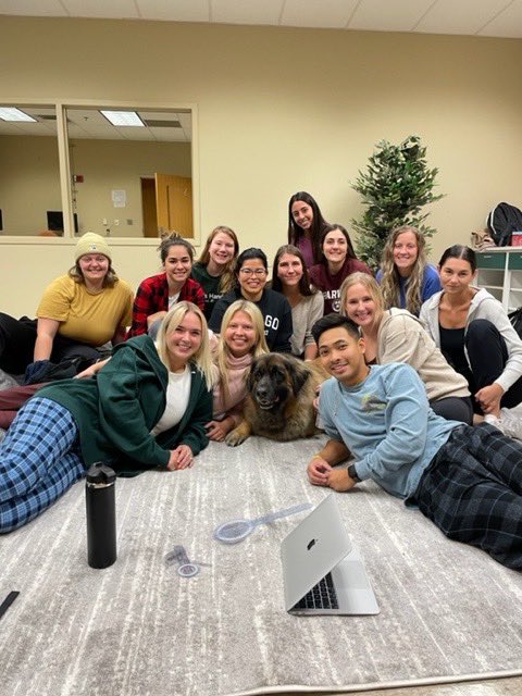 OT students love taking study breaks with out resident therapy dog Stella! Stella's human, Dr. Christine Kivlen, runs theSTudent Education: Learning aLongside Animals (STELLA) lab, where the super fluffy Leonberger lounges and works! #waynestate #wsuot