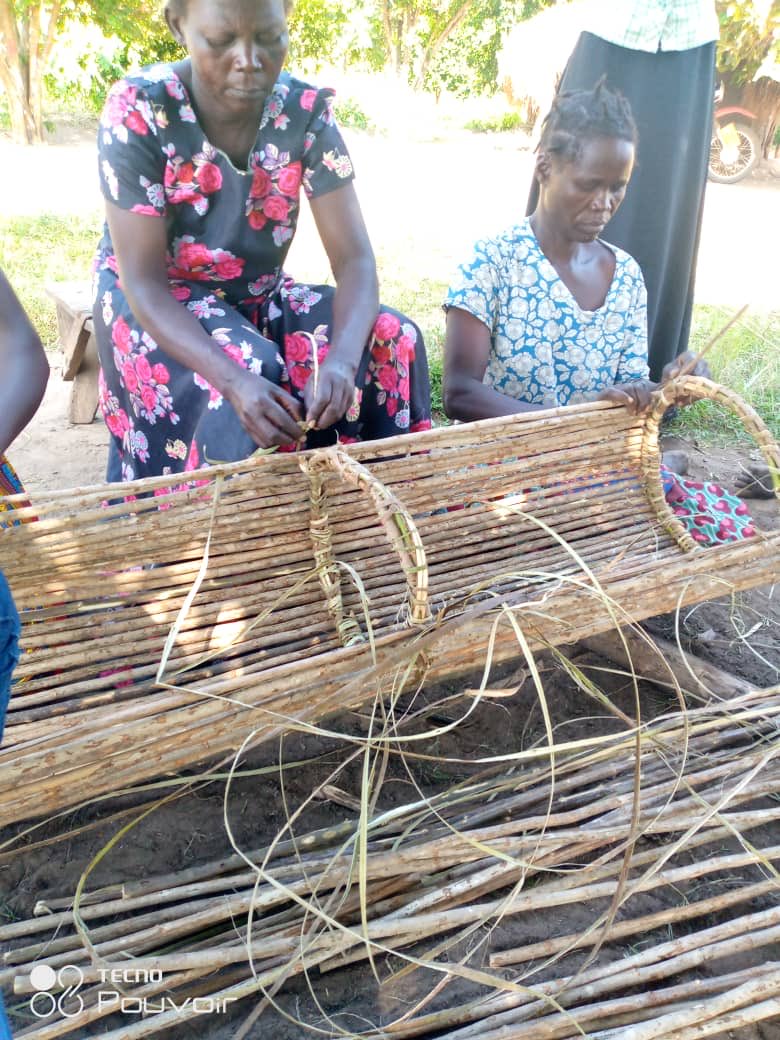 Women refugees in Rhino Camp making bee hives from local materials. With reduced food rations and the need for dignity LM International- I AS Uganda promotes sustainable livelihoods. ⁦<a href="/lminternationa1/">LM International</a>⁩ ⁦<a href="/Moglsd_UG/">Ministry of GenderUG</a>⁩ ⁦<a href="/IASKenya/">IAS Kenya Team</a>⁩ ⁦