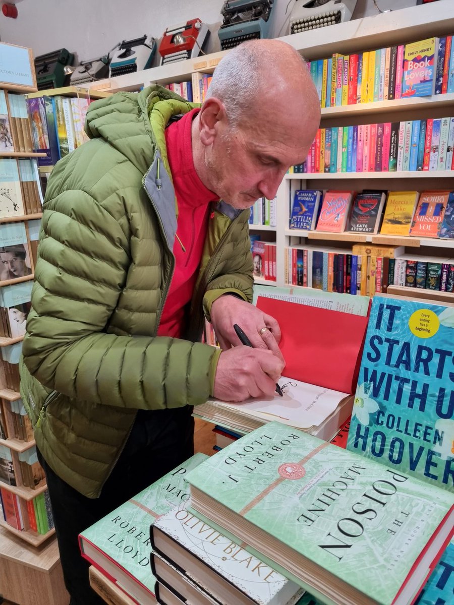 Oh look,  it's @robjlloyd signing books in our fabulous local bookshop,  @Bookishcrick. Pick up a copy right here book-ish.co.uk/product/978161… #thepoisonmachine