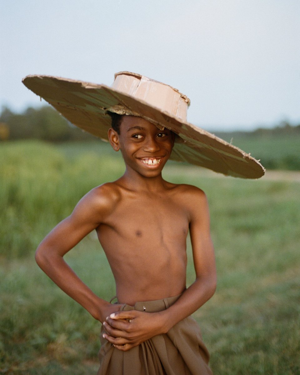 Portraits of my little brother and a hat he made, shot on film by me.