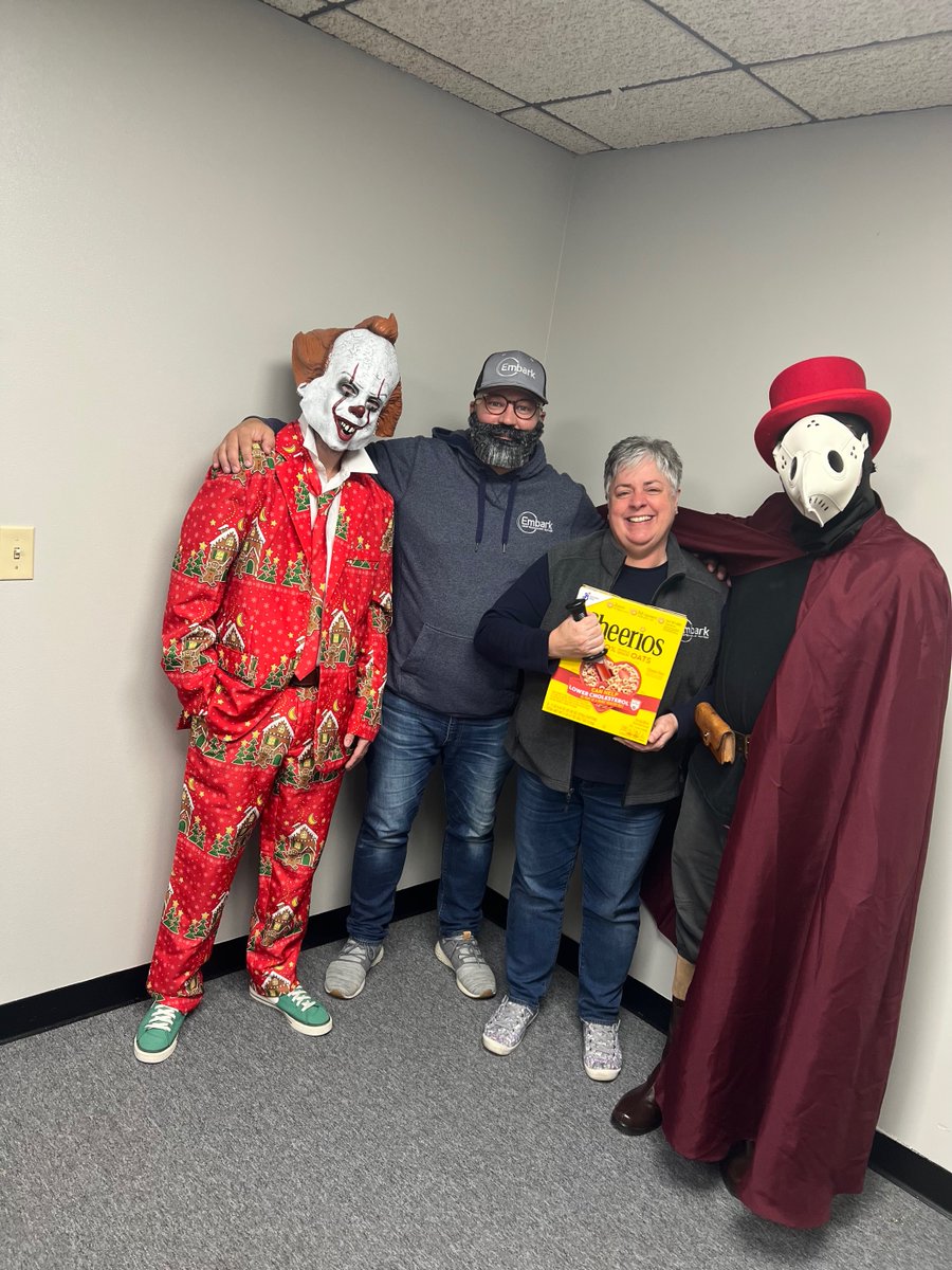 EmbarkIT's tweet image. The team at #EmbarkIT HAD to partake in some early #Halloween fun today at work. Please enjoy Tyler as Jason, the resemblance is uncanny. A Christmas Clown, a "Cereal killer," an injured soccer player, and an unofficial "Crowtagonist" from the unreleased video game "Crowsworn."