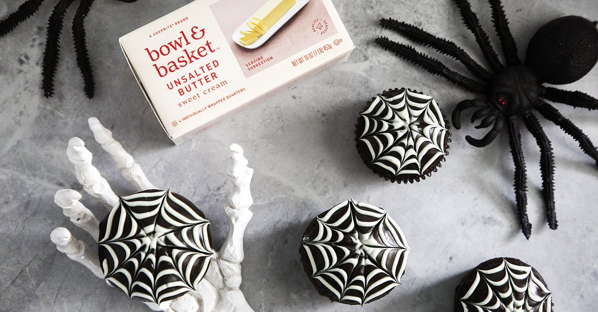 Spook up some Halloween fun with these Dark Chocolate Spiderweb Cupcakes! 🕸️🕷️ See this recipe and more at bit.ly/3U8YMSI #NationalChocolateDay #HappyHalloween #HalloweenTreats #HalloweenRecipes