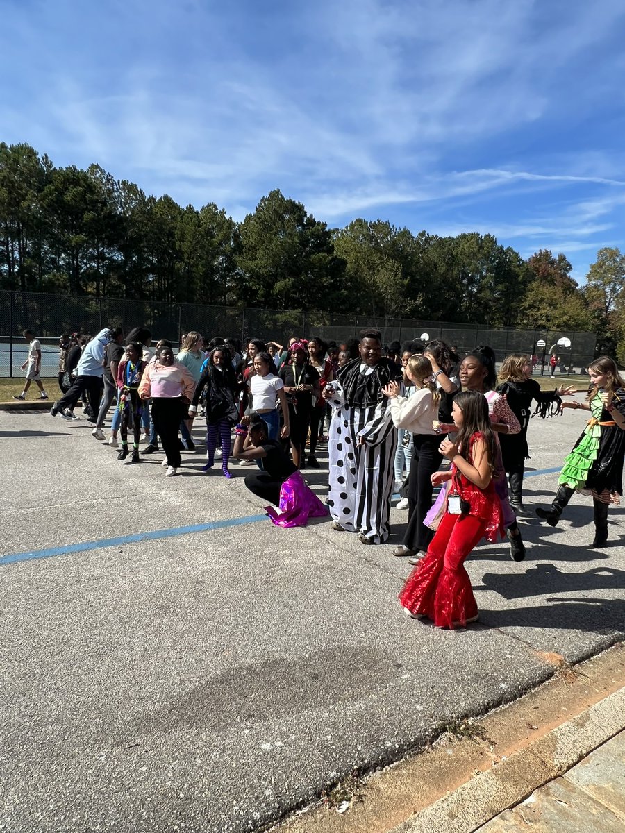 wright4kiddos's tweet photo. Wait- is that a TRex in the @CRISCougars dance off at the Fall Fest? https://t.co/oUw1mTzqna