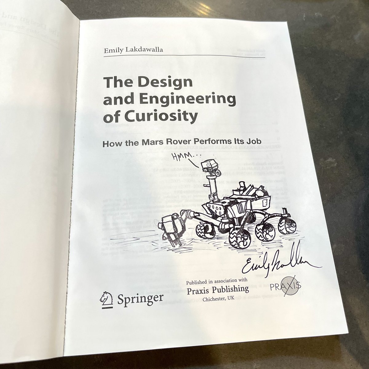 elakdawalla's tweet photo. I just got 10 copies of my book for resale as signed and arted copies. Just boxed up this one with its sketch of a confused rover. It’s pretty awesome to be able to get paid for doodling in textbooks, something I’ve done all my life! https://t.co/bpLDpjhpHG https://t.co/xmquReYJ5G