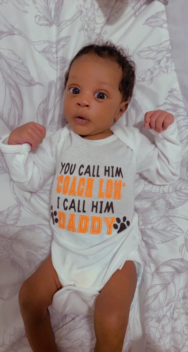 MrsStanley_'s tweet photo. Thank you for my onesie! @BAMOngc Now I can cheer daddy on from home in spirit! 🧡🖤 @LancasterFBwebo  @CoachLow90 https://t.co/ezWEq1VRGB