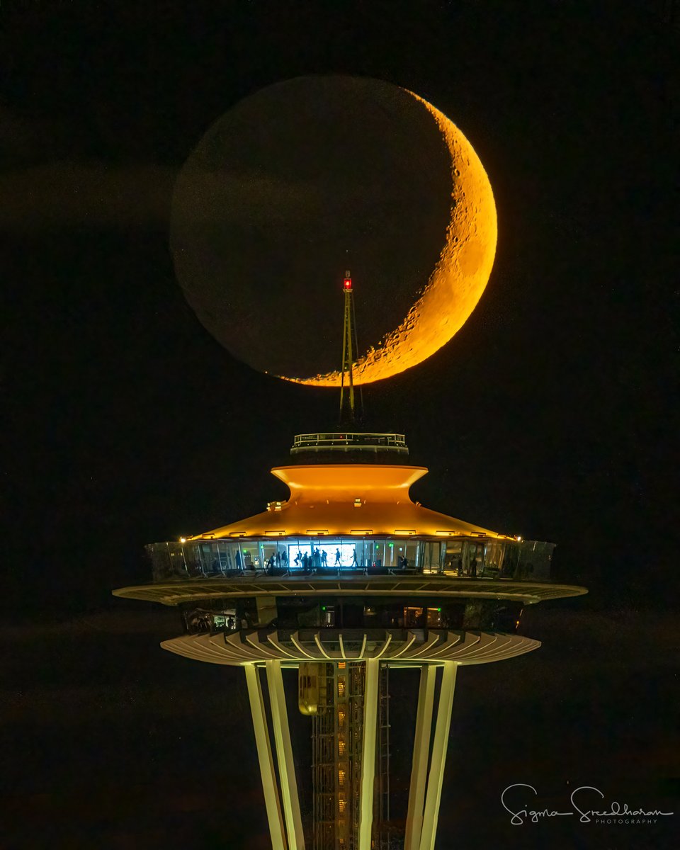 Tonight's #Crescent #Moonset behind #SpaceNeedle in #Seattle. I wasn't planning on a moonshot, but when I saw that gorgeous moon at sunset and an unexpected clear sky, I just had to go for it.