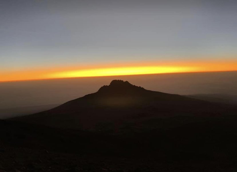 SarahBallinger1's tweet photo. We did it! 🏔#kilimanjaro Thanks to everyone for your kind donations and support. @CamAllianceGrp @GlamBrewingCo Hardest but the most magical experience 😄@2wishcharity https://t.co/wkIfGZ2hxA