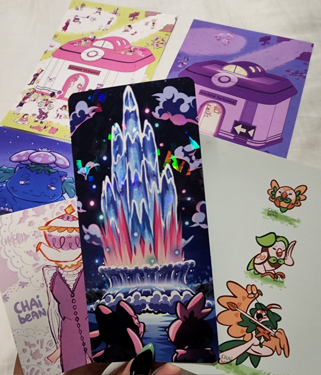 nShaydii's tweet photo. met the amazing @chai_bean today at the Super Effective concert and needless to say i splurged a little .. 

absolutely in love with her evolution line charms !! and she was nice enough to us the rowlet print for free because she ran out of the charm version 🥹🥹 https://t.co/vG8vkAWcyw