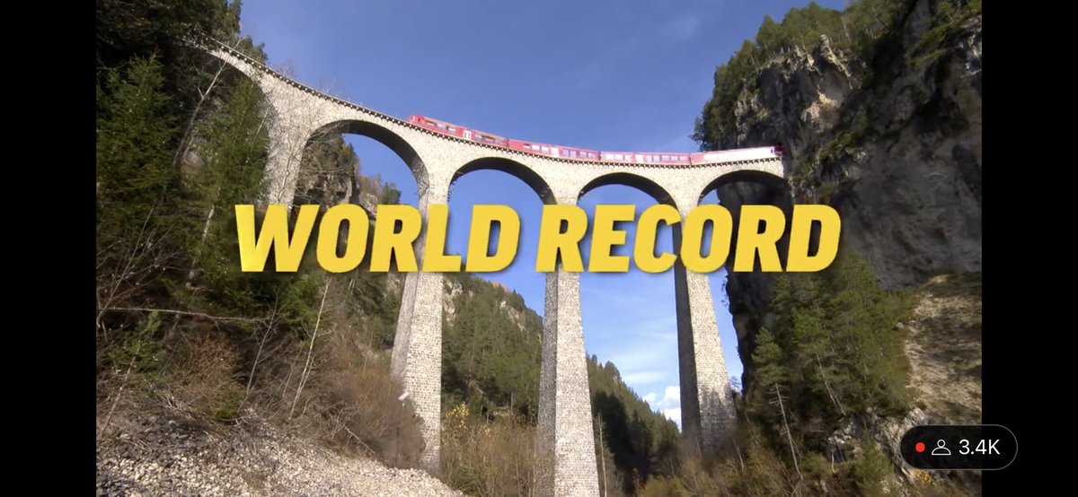 VoxScorpio's tweet photo. Longest passenger train ever pulls through Swiss Alps in World Record, Oct. 29th 2022 #rhb #train #rhbtrain https://t.co/n7EK5lbl0W
