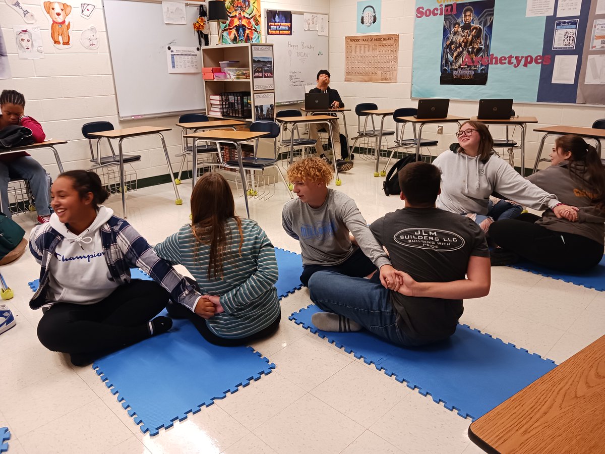 BuehlerMhs's tweet photo. Taking care of the social-emotional skills: The empathetic reader is emotionally impacted when reading Elie Wiesel's Holocaust memoir, Night. We had to take a break from the novel around Ch. 4 and recenter ourselves with partner yoga and poetry. Laughter ensued. 😊 https://t.co/jBDcLzAfYB