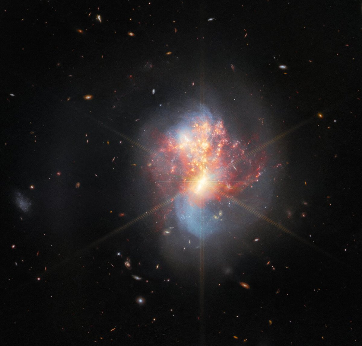 th_cosmological's tweet photo. The Webb Telescope captures the merger of two galaxies and a brilliant star formation almost 270 million light years away. https://t.co/2hSJkcGIm9