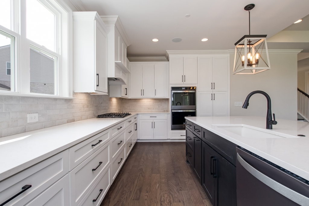 Now you see it; now you don’t! We love how seamless this kitchen looks when the pantry doors are closed. 

#celebrationhomes #luxuryhomes #morespacemorestyle #newconstruction #liveacelebration #hiddenpantry