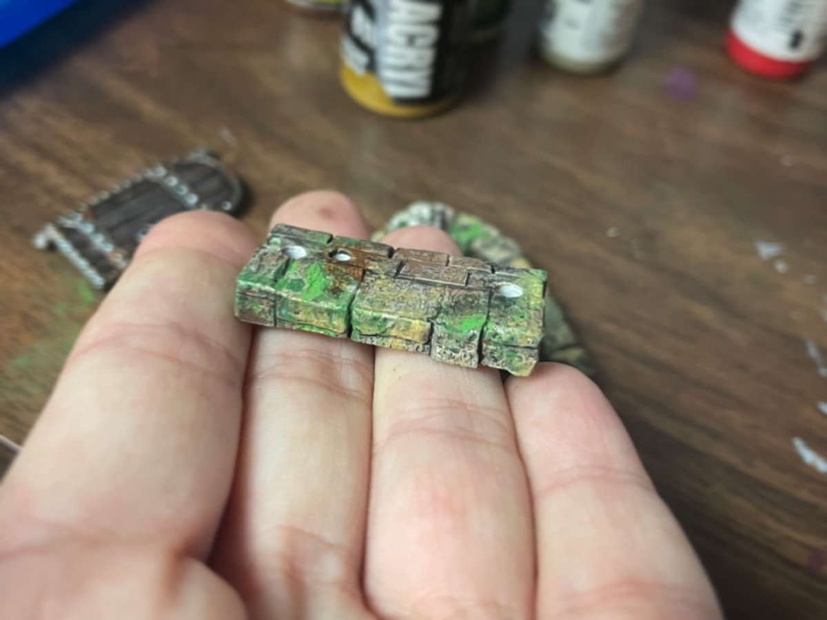Nerfblat's tweet photo. A door is painted and assembled. Now to add some vines and dirt and such. Turning out very adventurey ๐๐๐ #paintingminiatures #dnd #adventure #opensaysme https://t.co/dVGU6OAQ10