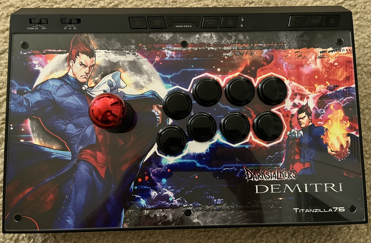 Titanzilla76's tweet photo. My Mad Catz Ego got a facelift!! Thank you @TheArcadeStick and Carlos Martinez for the artwork. Thank you @focusattack for the printing and the Sanwa metallic balltop. #fightstick #focusattack #thearcadestick #madcatz #madcatzego #arcadestick #darkstalkers #demitri https://t.co/LEiTsKzN3x