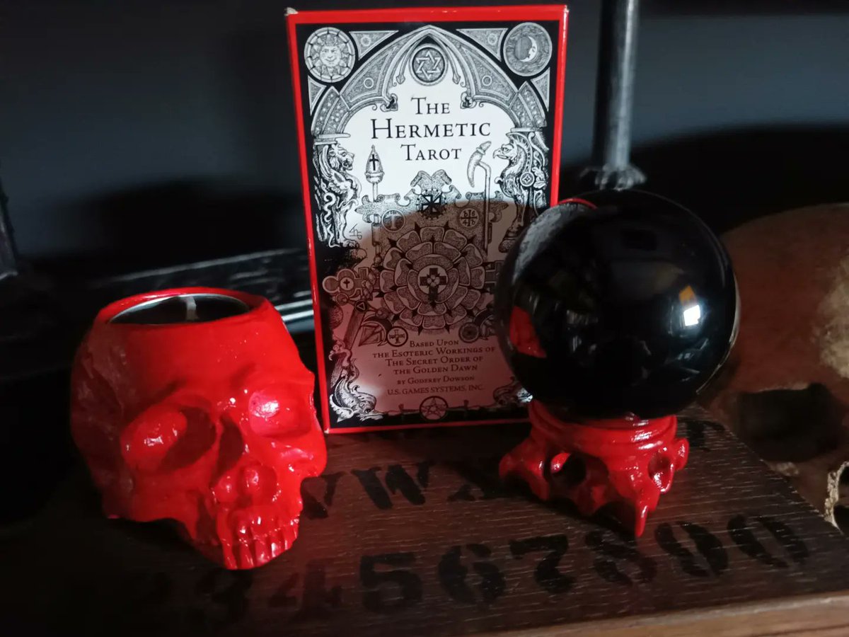 WickedVintageUK's tweet photo. New arrival, vintage divination box with painted #Ouija and #Skull decoration- box contains a #BlackObsidian crystal ball, The #HermeticTarot deck, and a skull candle holder with black opium tealight 💀🕯️🔮 #Halloween #SpookySeason #AltarBox https://t.co/44wJ4rVvTP