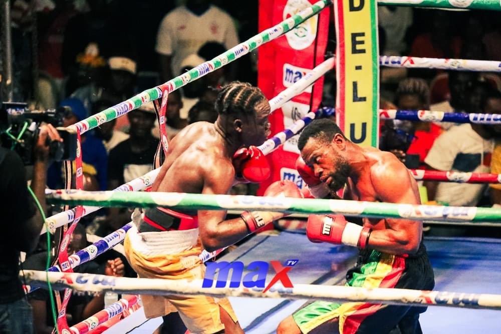 GhanaBoxing's tweet photo. We've witnessed a stunner! Eric Quarm (black trunks) who has been impressive in the league so far, was stunned by Samuel Quaye, after being knocked down 2x.

#GBA
 #BoxingNews
 #GhanaBoxing
 #DeluxyProfessionalBoxingLeague
#fightnight16 https://t.co/VpCXLD7kYN
