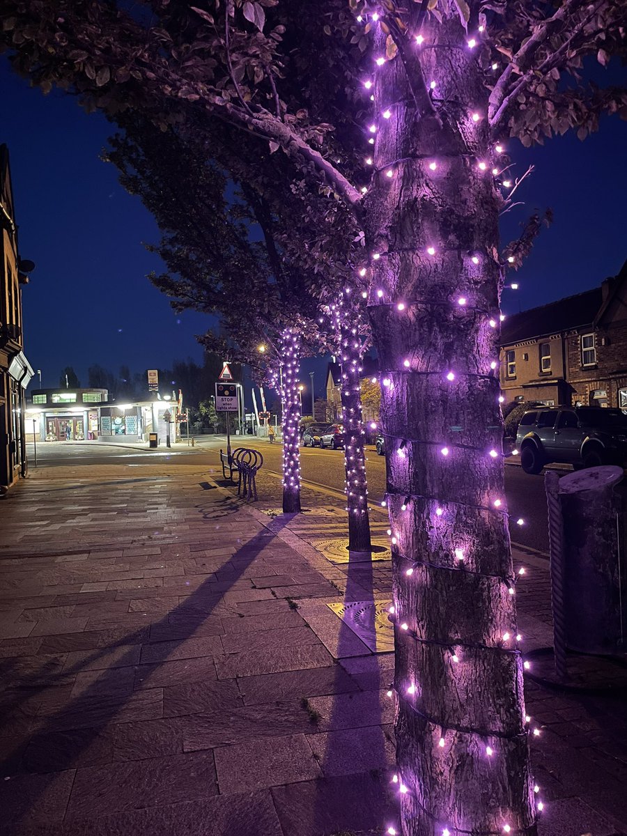 The seasonal pink lights are turned on in Hoylake when the clocks go back. Here they are lighting the way to Hoylake Station #pinklights #treelights #Hoylake #railwaystation