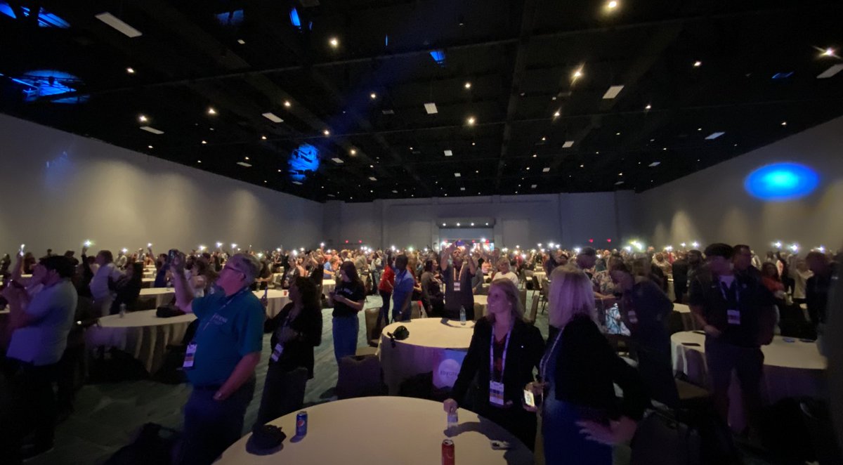 PLTWorg's tweet photo. Turn on those phone flashlights - we’re jamming to the newly released ‘@PLTWorg Anthem,’ inspired &amp; written by #PLTWSummit attendees! #PLTW https://t.co/1cwFstZCkd