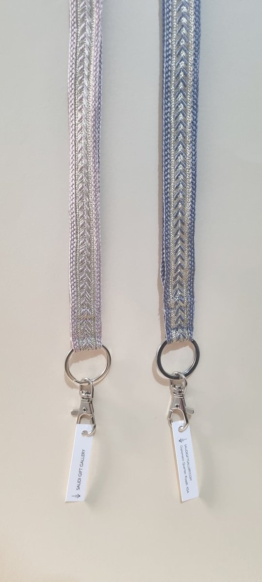 GallerySaudi's tweet photo. Saudi Design lanyards are inspired by traditional Saudi garments, adorned
with gold and silver embroidery. Embellished attire is a powerful cultural statement reflecting social values and identities.For more information contact +966 55 100 8297 or DM #saudimade #corporategifts https://t.co/gyNDq4HOAH
