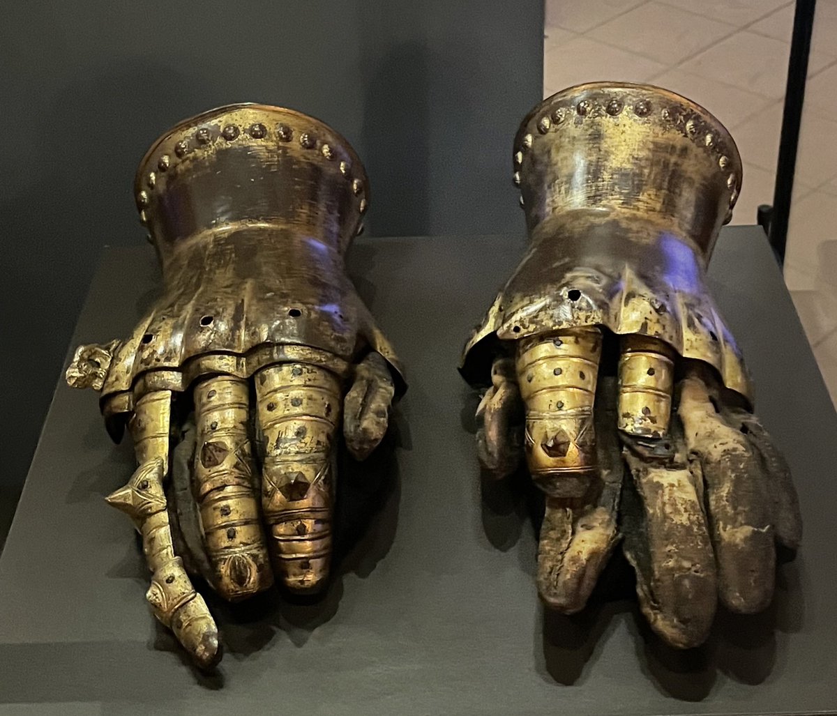 On temporary display in the crypt at Canterbury: Edward the Black Prince's gauntlets, originally studded with miniature lions on the knuckles (only one survives) - 14th century. F***ing terrifying.