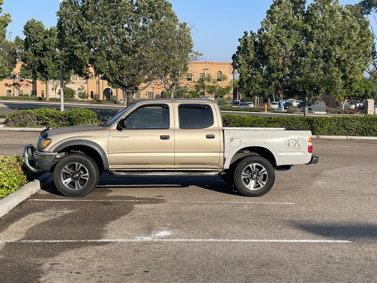 thomaskim619's tweet photo. ‼️Please Repost‼️

Hey bay area peeps! My girlfriend got her car stolen last night. It was parked on Anza and Cook in the city. If you see it around please feel free to DM me. TY💛

The car:
Gold toyota tacoma with a white bed and a super large tacoma logo on the truck bed door. https://t.co/d7oZXKxJU4