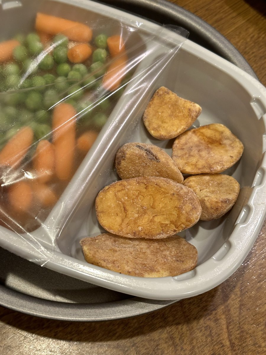 IAreDom's tweet photo. Disappointed in your chicken dinners this time @Tesco as these potatoes are not the usual fare. 👎🏻👎🏻👎🏻 usually nice and fluffy but these resemble crisps with veins. Not impressed. https://t.co/VEYkKHrPvM