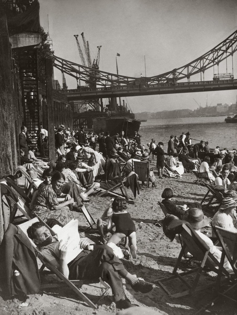 Londoners enjoying the sun on Tower Beach near the Tower of London, 1936